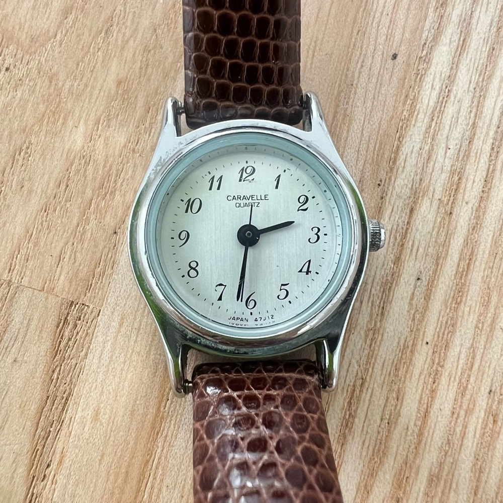 Caravelle by Bulova ladies silver tone brown leather dress watch NEW BATTERY